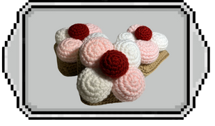 Crocheted Sponch cookies on a pixel illustration of a pan